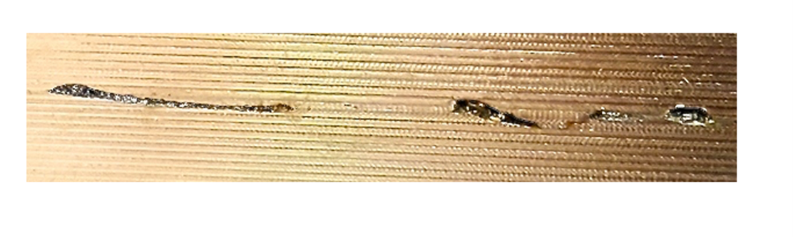 Slag Inclusions revealed in a weld during machining